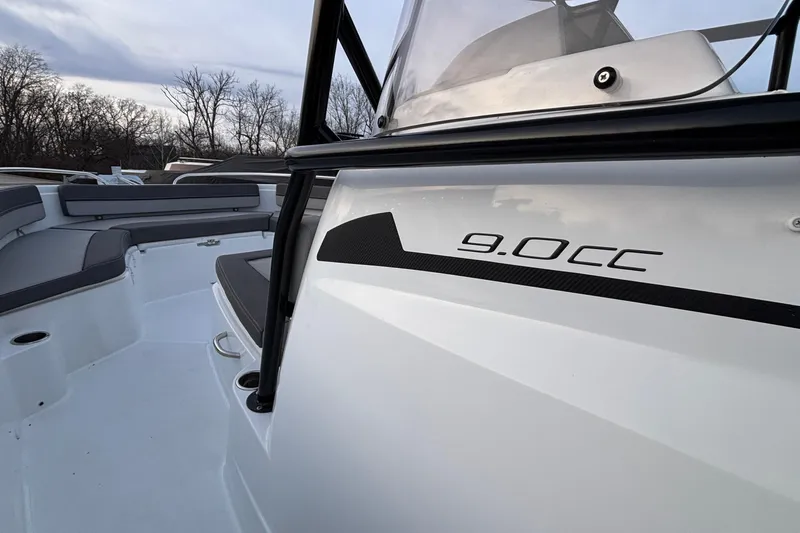  Yacht Photos Pics 2022 Jeanneau Leader 9.0 CC boat interior with seating, sleek design, and branding.