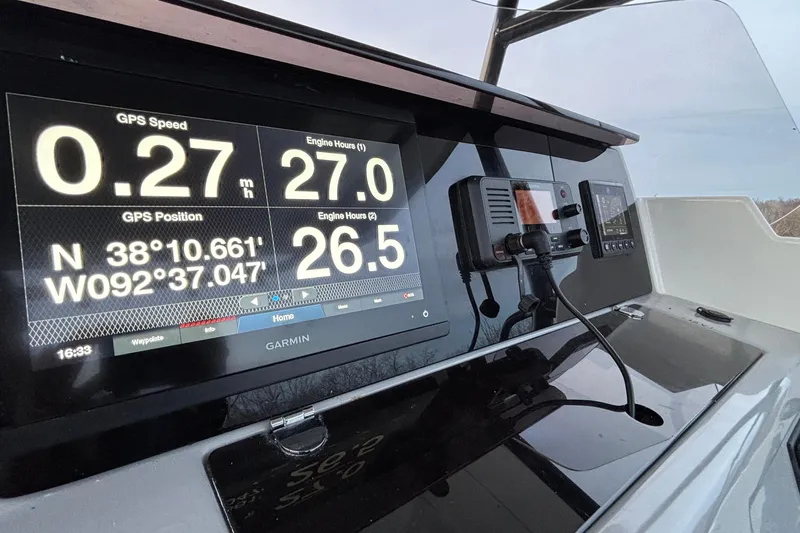  Yacht Photos Pics Dashboard of 2022 Jeanneau Leader 9.0 CC with GPS and engine data display.