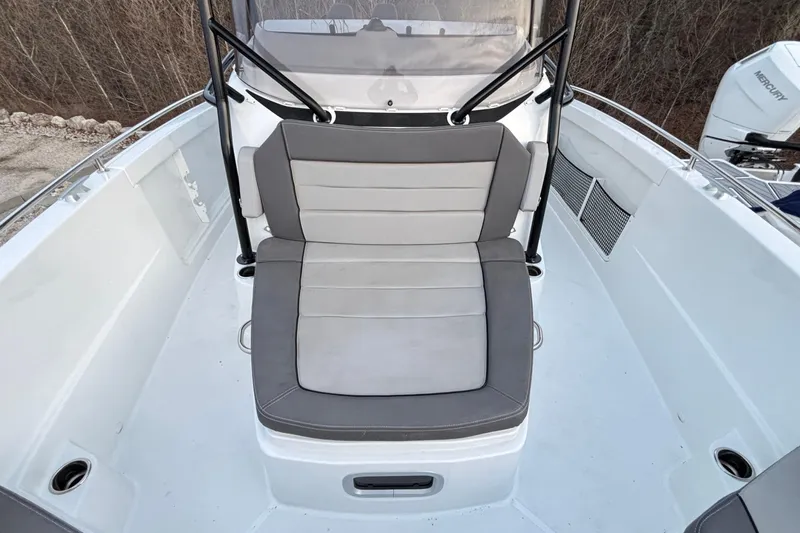  Yacht Photos Pics 2022 Jeanneau Leader 9.0 CC boat interior with cushioned seating and modern design.