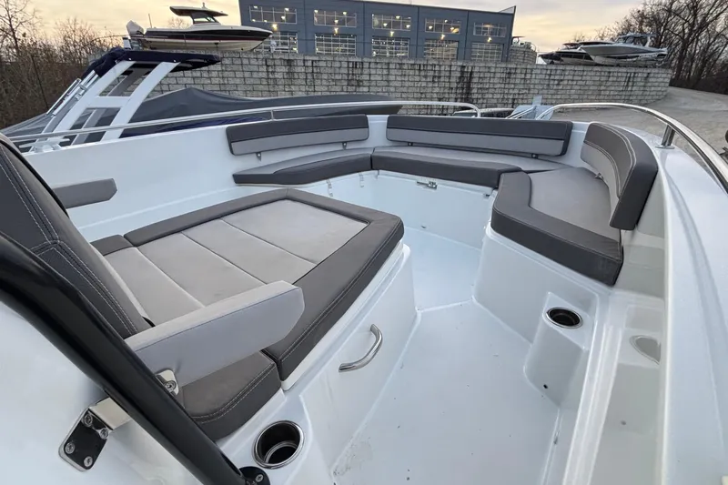  Yacht Photos Pics 2022 Jeanneau Leader 9.0 CC boat interior with cushioned seating and modern design.
