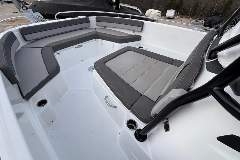  Yacht Photos Pics 2022 Jeanneau Leader 9.0 CC boat interior with gray cushioned seating.