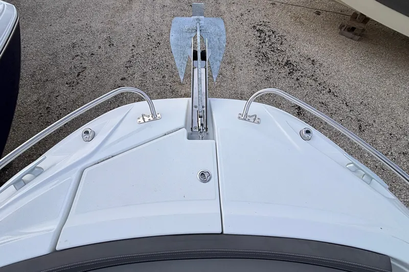  Yacht Photos Pics Bow view of 2022 Jeanneau Leader 9.0 CC with anchor and railings.