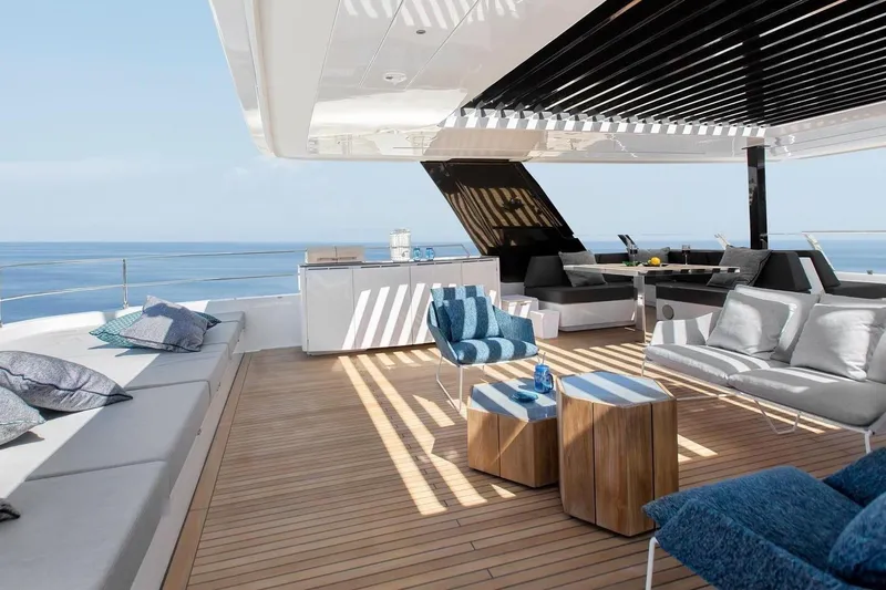 Yacht Photos Pics Luxurious Sunreef 80 Power yacht deck with modern seating, ocean view, and elegant design, 2020 model.