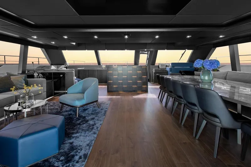  Yacht Photos Pics Luxurious interior of 2020 Sunreef 80 Power yacht with elegant seating and dining area.