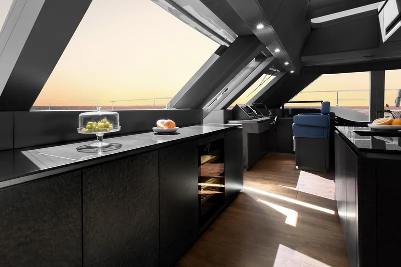  Yacht Photos Pics Luxurious interior of 2020 Sunreef 80 Power yacht with modern kitchen and sunset view.