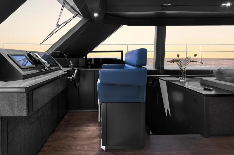  Yacht Photos Pics Luxurious interior of 2020 Sunreef 80 Power yacht with modern helm and panoramic windows.