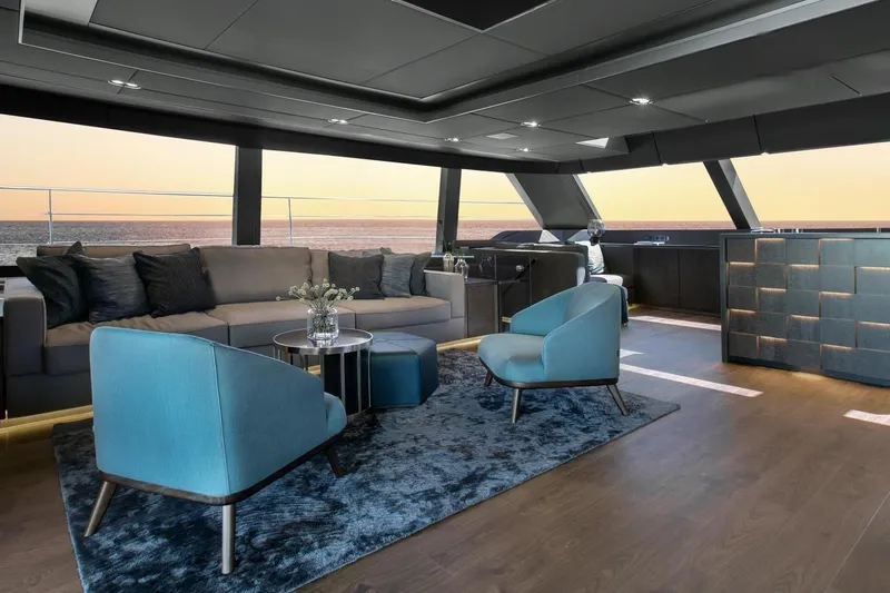 Yacht Photos Pics Luxurious interior of 2020 Sunreef 80 Power yacht with modern seating and ocean view.