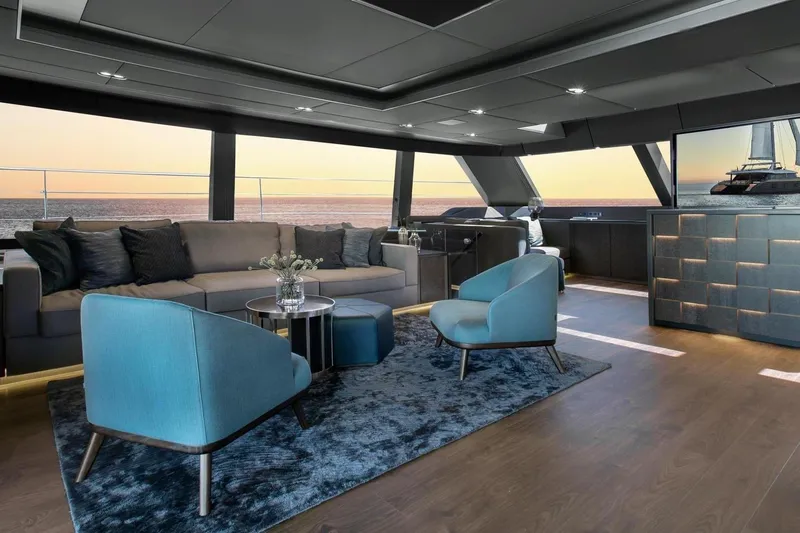  Yacht Photos Pics Luxurious interior of 2020 Sunreef 80 Power yacht with modern seating and ocean view.