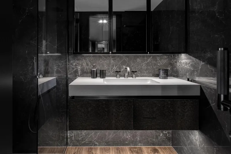  Yacht Photos Pics Luxurious bathroom interior on 2020 Sunreef 80 Power yacht, featuring sleek marble design.