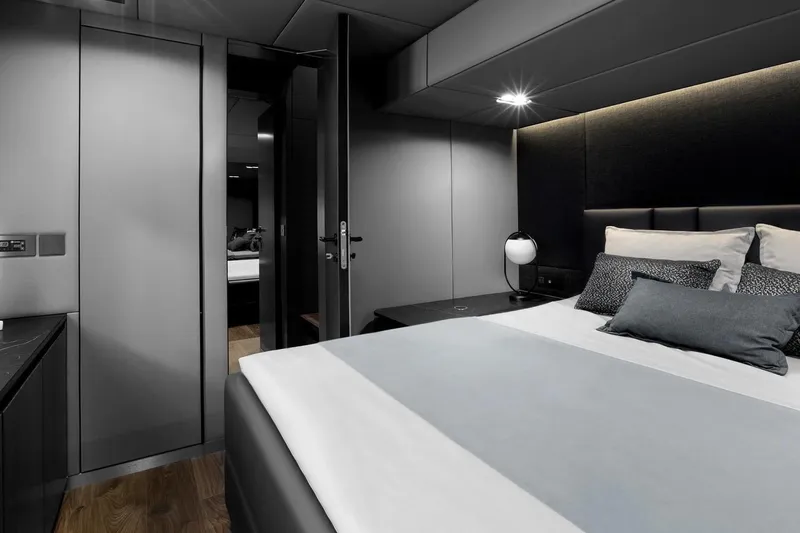  Yacht Photos Pics Luxurious bedroom interior of 2020 Sunreef 80 Power yacht with modern design elements.