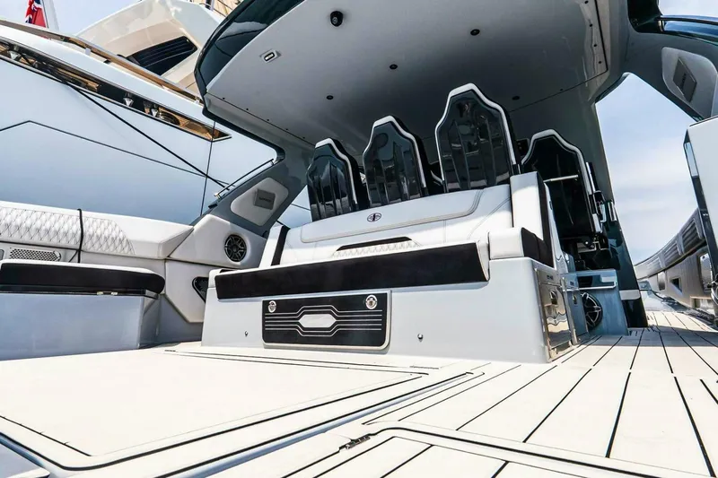  Yacht Photos Pics 2025 Cigarette 52' Thunder yacht interior with luxurious seating and sleek design.