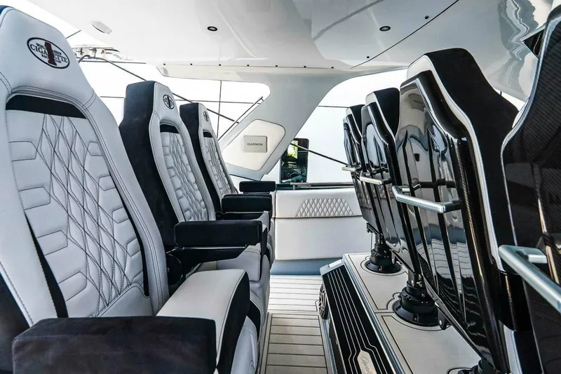  Yacht Photos Pics Luxurious interior seating of 2025 Cigarette 52' Thunder boat, featuring sleek design and premium materials.