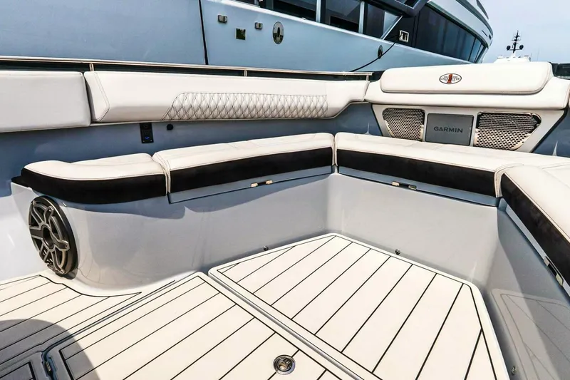  Yacht Photos Pics Luxurious seating area on 2025 Cigarette 52' Thunder boat with Garmin system.