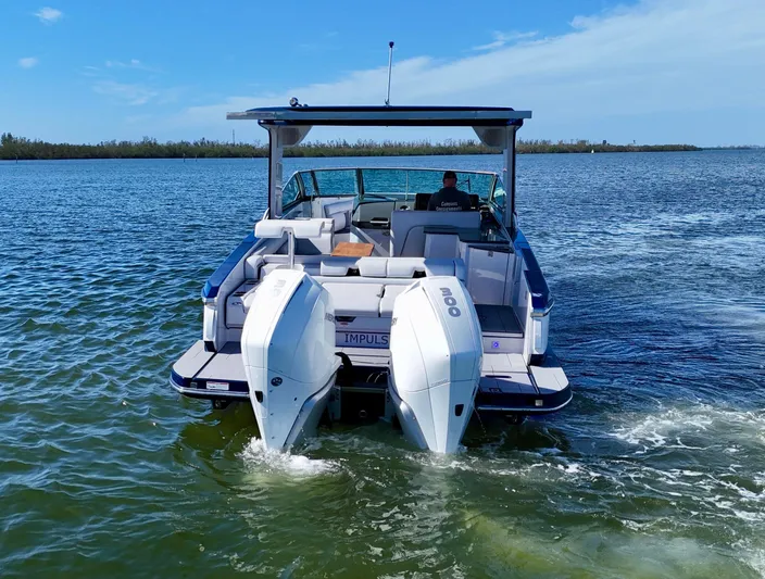 Impulse Yacht Photos Pics 2022 Aviara AV 32 Outboard boat cruising on a sunny day.