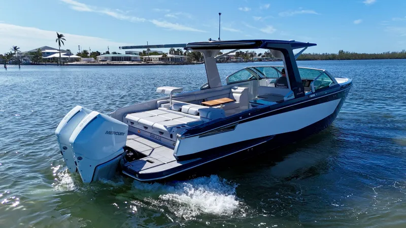 Impulse Yacht Photos Pics 2022 Aviara AV 32 Outboard boat cruising on a sunny day.