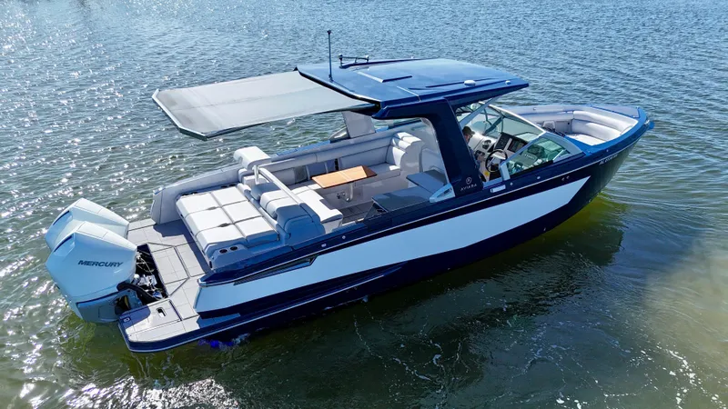 Impulse Yacht Photos Pics 2022 Aviara AV 32 Outboard boat on water, featuring spacious seating and modern design.