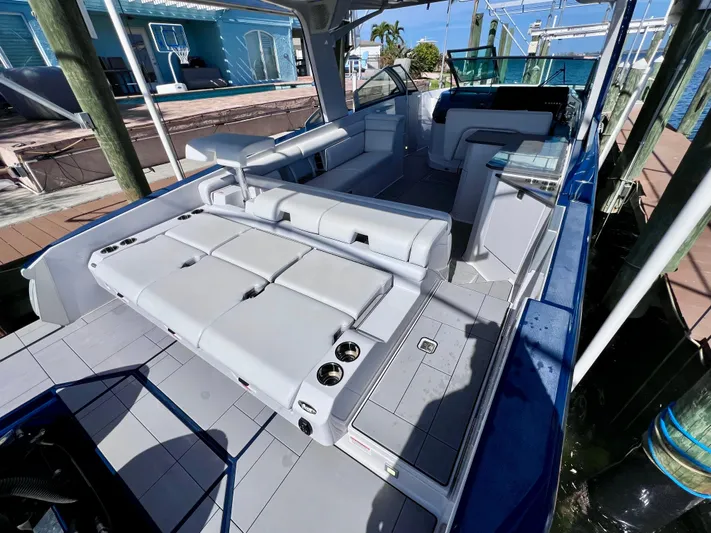 Impulse Yacht Photos Pics 2022 Aviara AV 32 Outboard boat interior with luxurious seating and modern design.