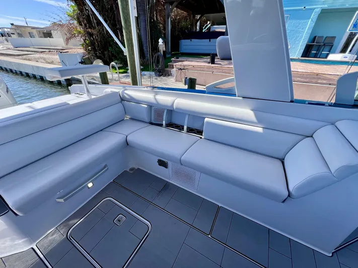 Impulse Yacht Photos Pics Luxurious seating area on 2022 Aviara AV 32 Outboard boat, featuring sleek design and modern amenities.