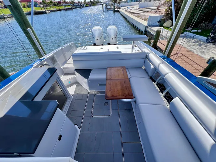 Impulse Yacht Photos Pics Luxurious 2022 Aviara AV 32 Outboard boat with spacious seating and sleek design.