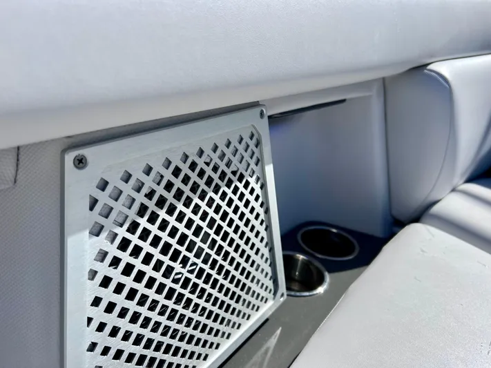 Impulse Yacht Photos Pics Aviara AV 32 Outboard 2022 interior detail with vent and cup holder.