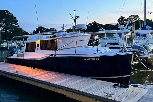 Sea Glass II Yacht Photos Pics 2024 Ranger Tugs R-27 Luxury Edition docked at sunset.