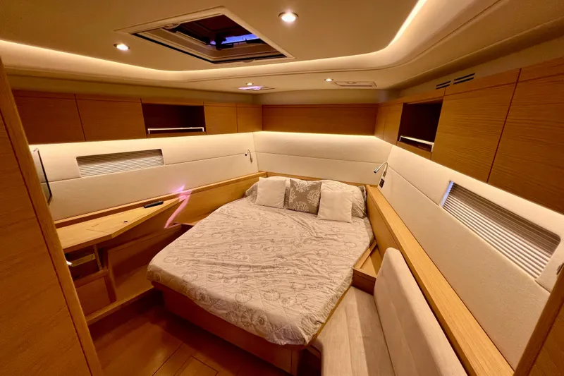 Gr Yacht Photos Pics Luxurious cabin interior of 2017 Grand Soleil 52LC yacht with modern wood finish.