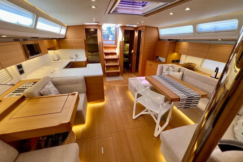 Gr Yacht Photos Pics Luxurious interior of 2017 Grand Soleil 52LC yacht with modern wood finish.
