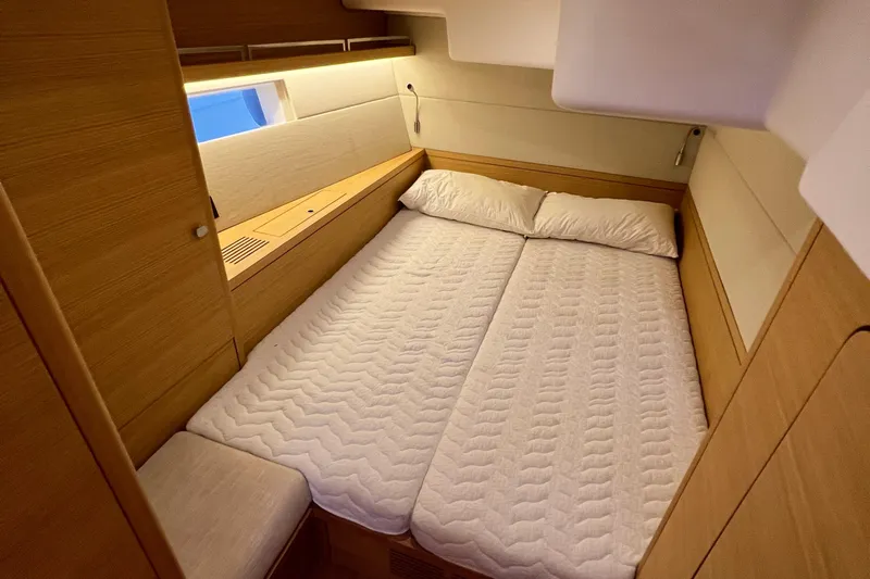 Gr Yacht Photos Pics Luxurious cabin interior of 2017 Grand Soleil 52LC yacht with cozy double bed.