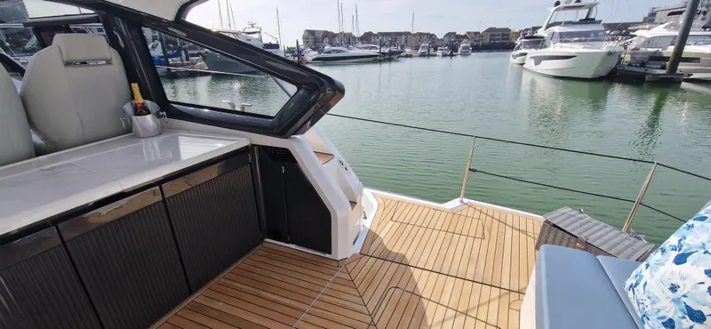  Yacht Photos Pics Fairline Targa 40 2024 at a sunny marina.