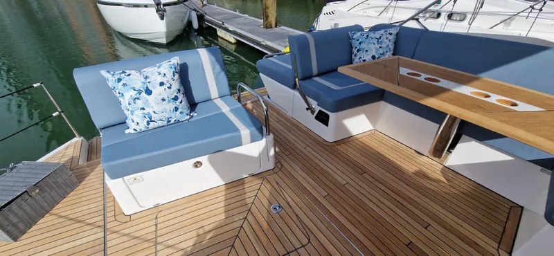  Yacht Photos Pics Fairline Targa 40, 2024, luxury boat seating area with wooden deck.