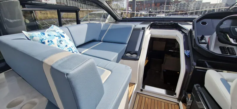  Yacht Photos Pics Interior of 2024 Fairline Targa 40 yacht with blue upholstery.