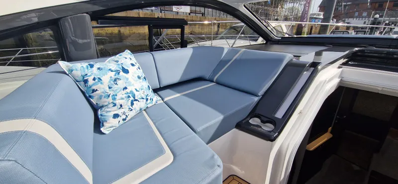  Yacht Photos Pics Interior of Fairline Targa 40 yacht, 2024, featuring blue upholstery.