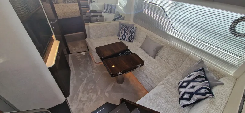  Yacht Photos Pics Interior of Fairline Targa 40 yacht, 2024, featuring elegant seating area.