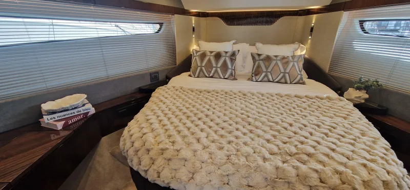  Yacht Photos Pics Luxurious bedroom in Fairline Targa 40 yacht, 2024 model.