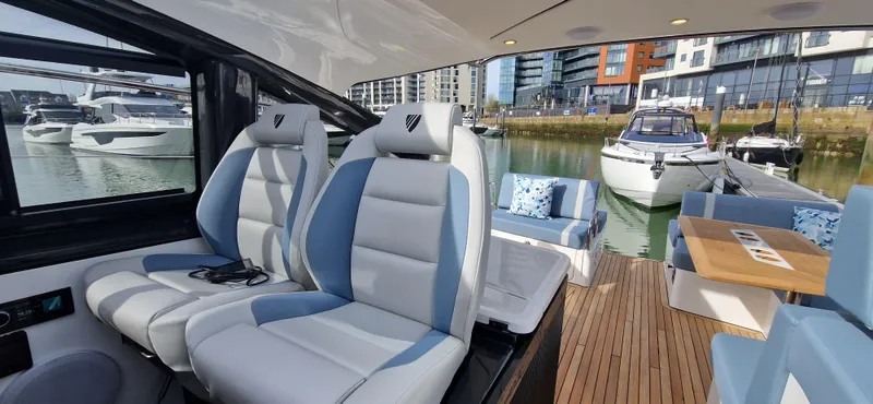  Yacht Photos Pics Interior of Fairline Targa 40 yacht, 2024 model, featuring luxurious seating.