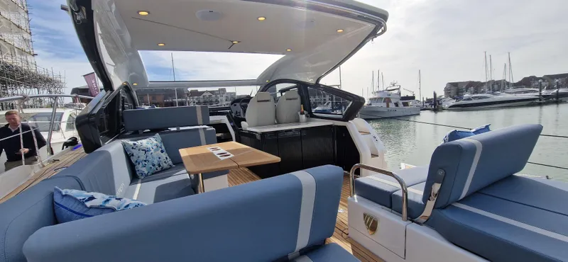 Yacht Photos Pics Interior of Fairline Targa 40 yacht, 2024 model, featuring luxurious seating area.