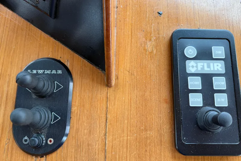 Qui-si-sana Yacht Photos Pics Control panel of a 1989 Jefferson 52 Victory boat with Lewmar and FLIR devices.