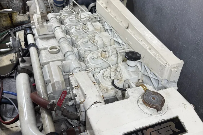 Qui-si-sana Yacht Photos Pics Engine of a 1989 Jefferson 52 Victory, showcasing intricate mechanical components.