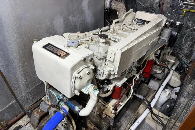 Qui-si-sana Yacht Photos Pics Engine room of a 1989 Jefferson 52 Victory yacht with a Lugger engine.