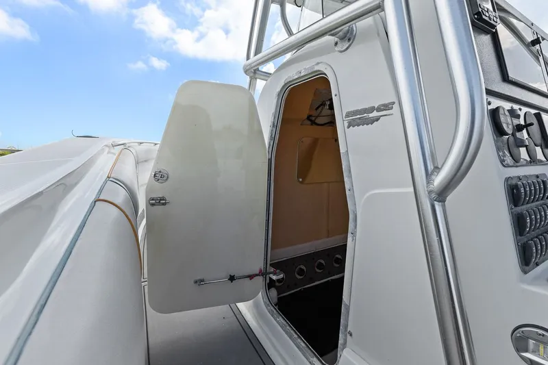  Yacht Photos Pics 2004 Hydra-Sports Vector 3300 CC boat door and control console.