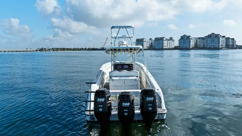  Yacht Photos Pics 2004 Hydra-Sports Vector 3300 CC boat on calm water.