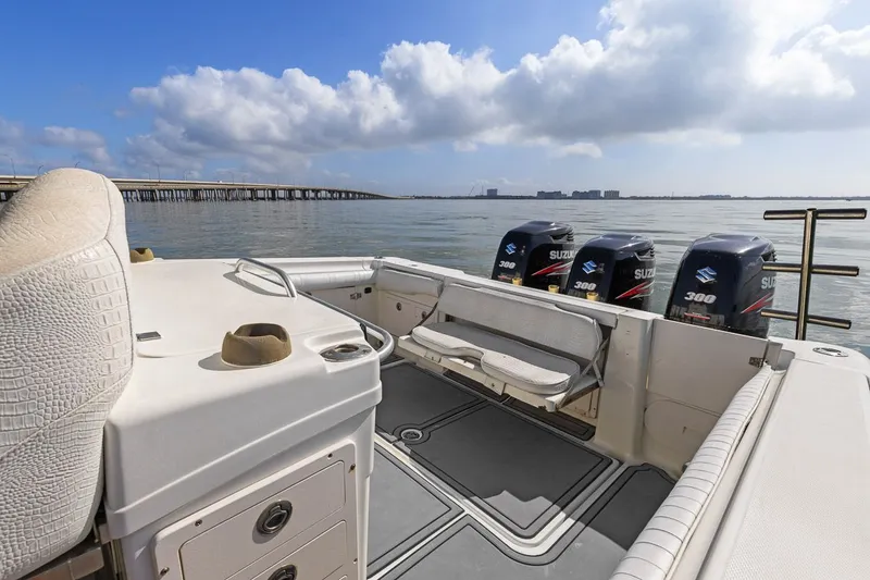  Yacht Photos Pics 2004 Hydra-Sports Vector 3300 CC with Suzuki engines on calm water.