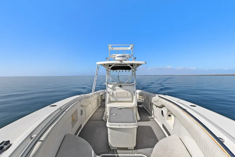  Yacht Photos Pics 2004 Hydra-Sports Vector 3300 CC on calm sea.