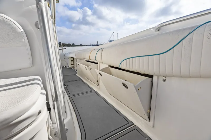  Yacht Photos Pics 2004 Hydra-Sports Vector 3300 CC interior view with storage compartments.