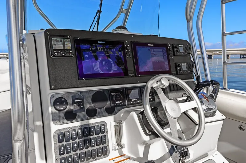  Yacht Photos Pics Helm console of a 2004 Hydra-Sports Vector 3300 CC boat.