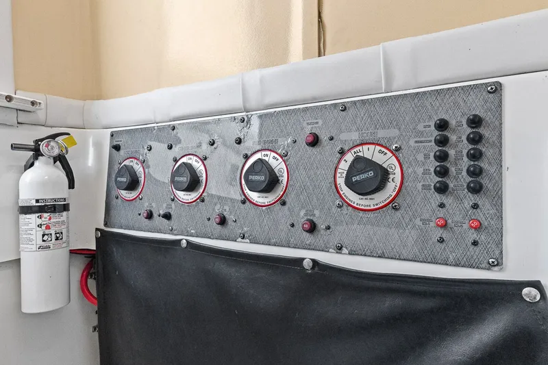  Yacht Photos Pics 2004 Hydra-Sports Vector 3300 CC control panel with fire extinguisher.