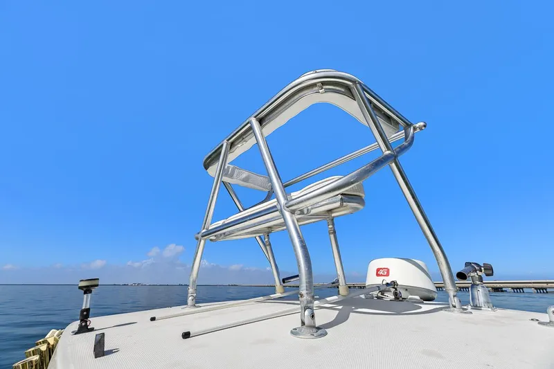  Yacht Photos Pics 2004 Hydra-Sports Vector 3300 CC boat with blue sky.