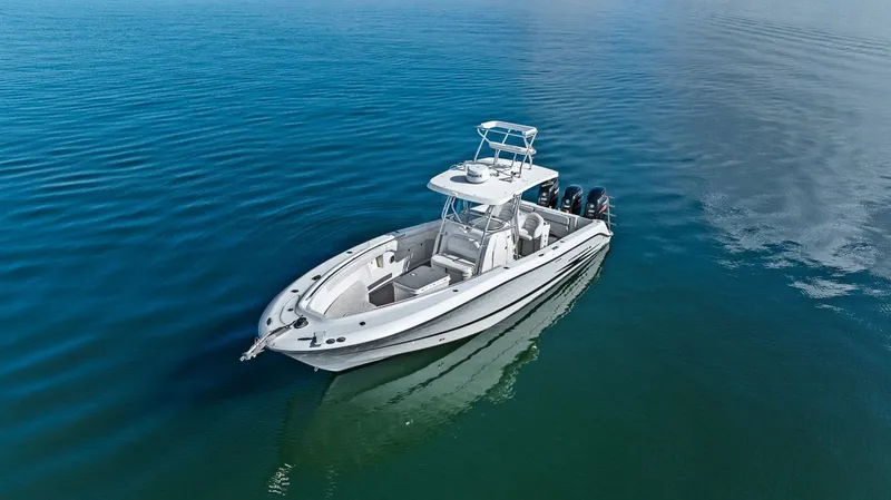  Yacht Photos Pics 2004 Hydra-Sports Vector 3300 CC on calm water.