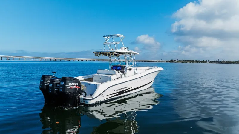  Yacht Photos Pics 2004 Hydra-Sports Vector 3300 CC on calm water.