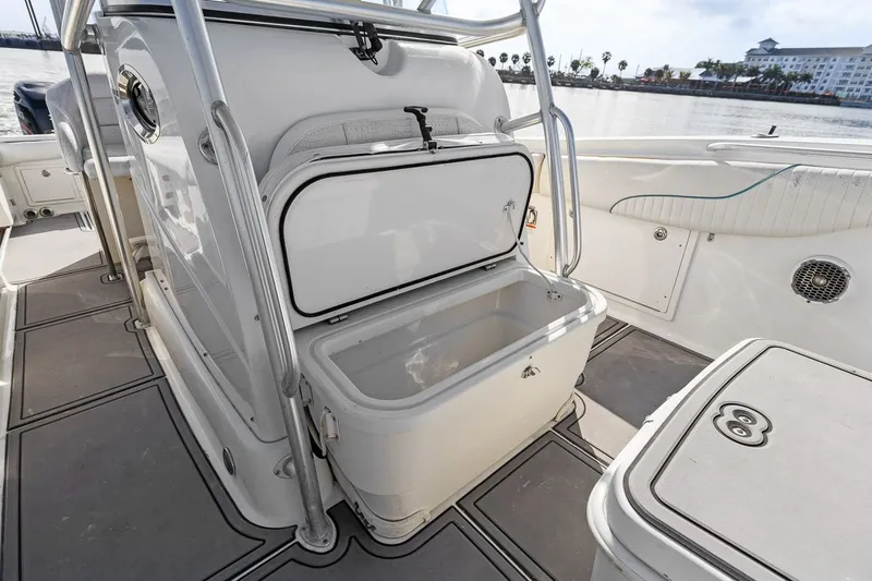  Yacht Photos Pics 2004 Hydra-Sports Vector 3300 CC boat interior with storage compartment.